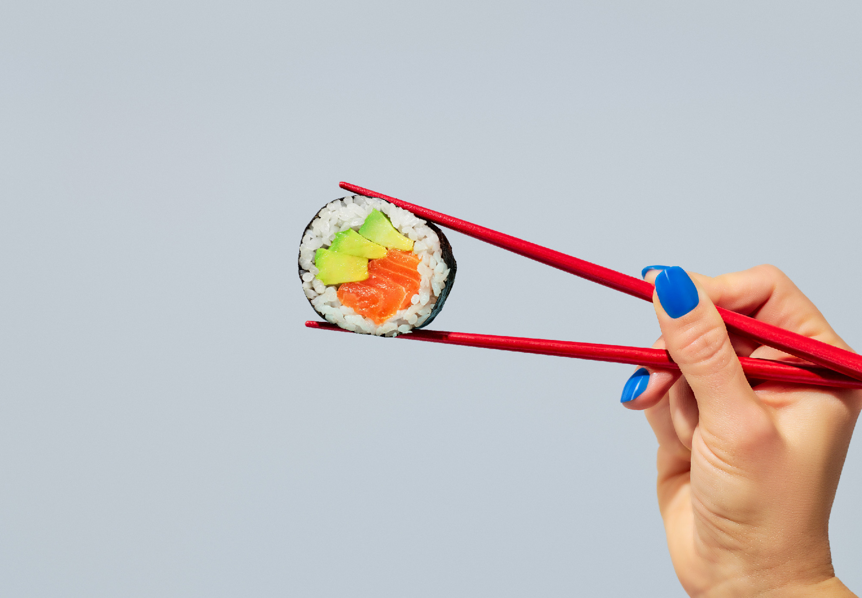 Holding sushi